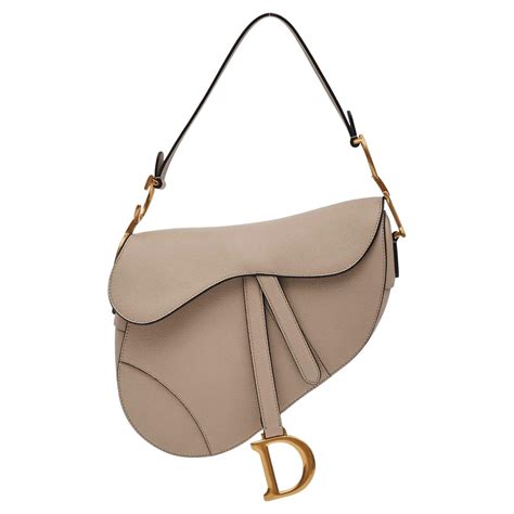beige dior saddle